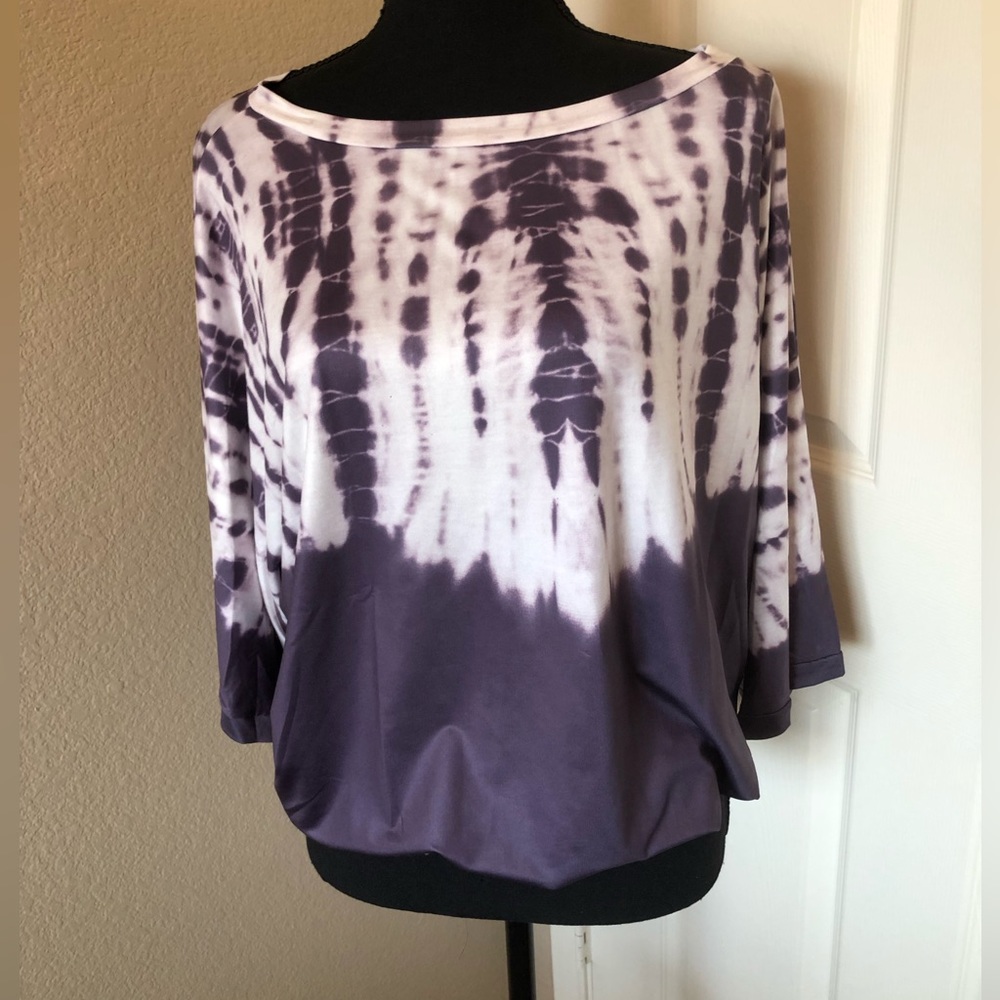 Purple and white Tie-dye shirt.